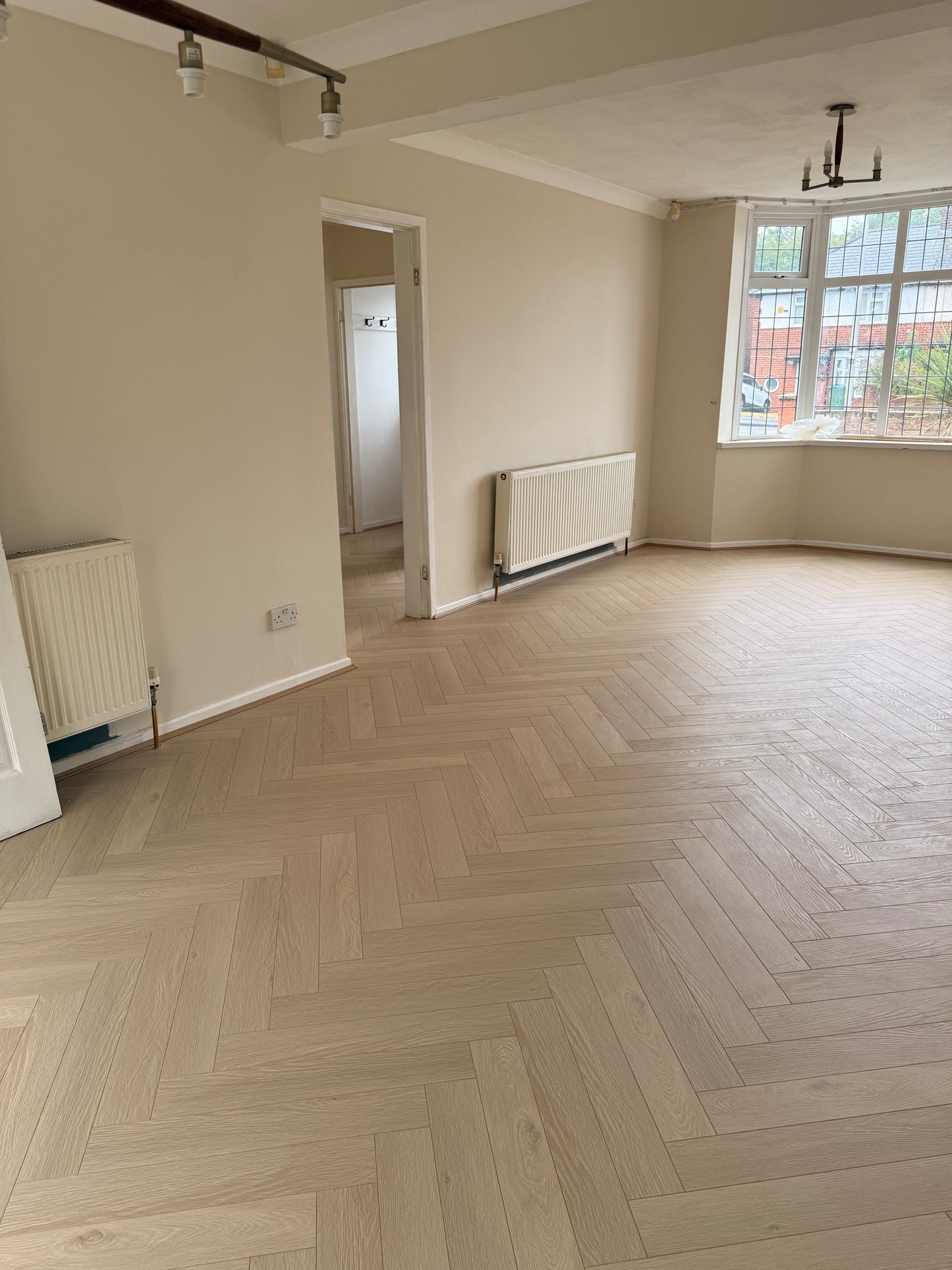 Denver Oak herringbone Laminate