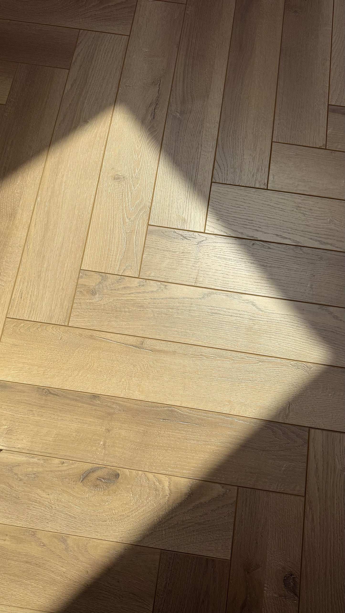 Greige Oak Herringbone Laminate